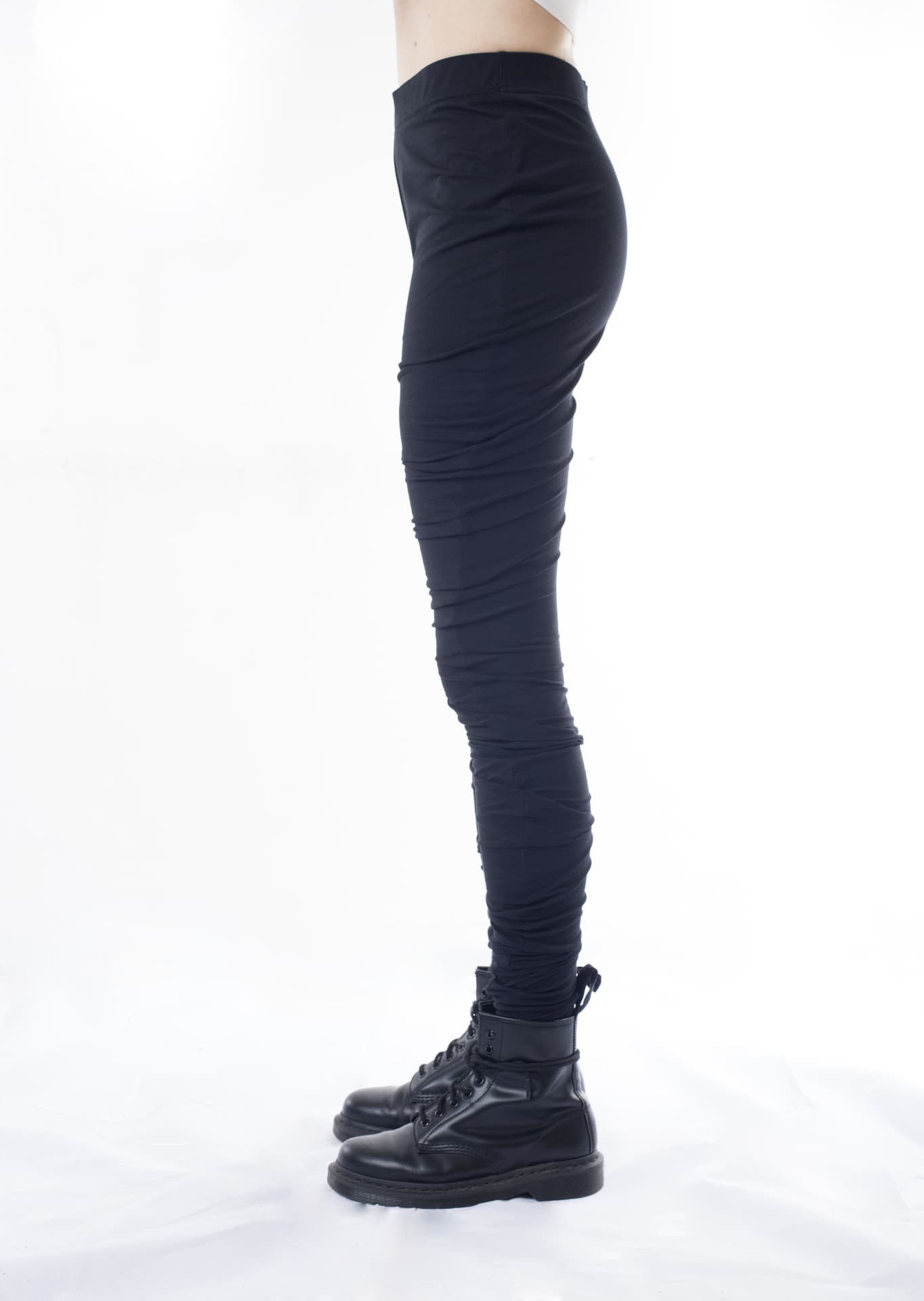 Naga Leggings in black, worn — side